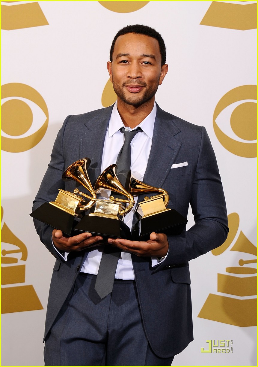 LOS ANGELES, CA - FEBRUARY 13: Musician John Legend, winner of the Best R&B Album award for "Wake Up!" and Best R&B Song award for "Shine" and the Best Traditional R&B Vocal Performance award for ""Hang on in There"" poses in the press room at The 53rd Annual GRAMMY Awards held at Staples Center on February 13, 2011 in Los Angeles, California. (Photo by Kevork Djansezian/Getty Images)